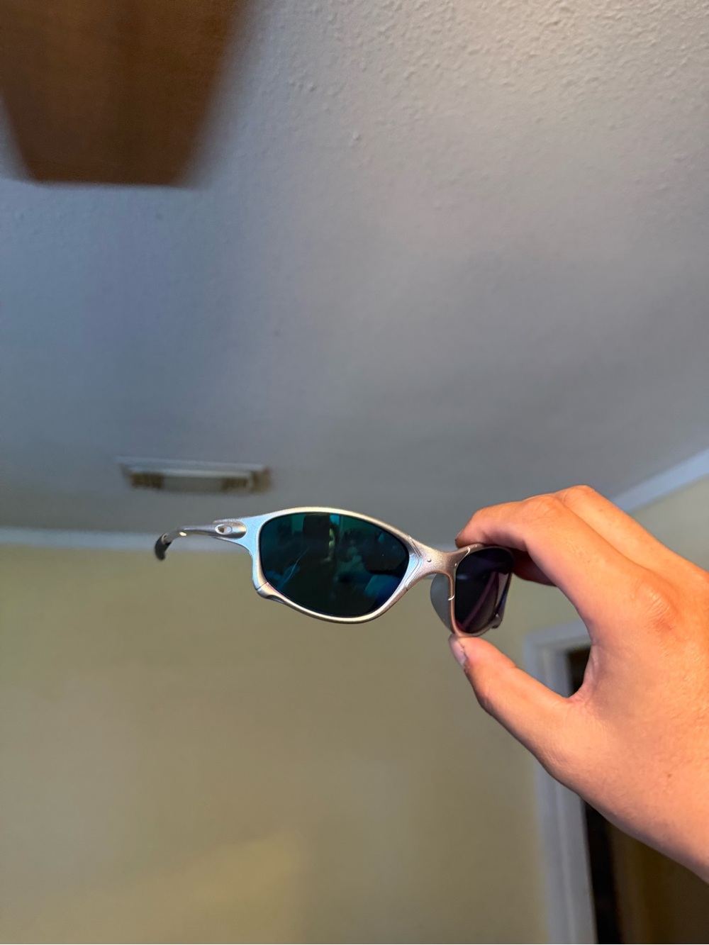 Silver Frame Sunglasses with Green Reflective Lenses Oakley Oakleys